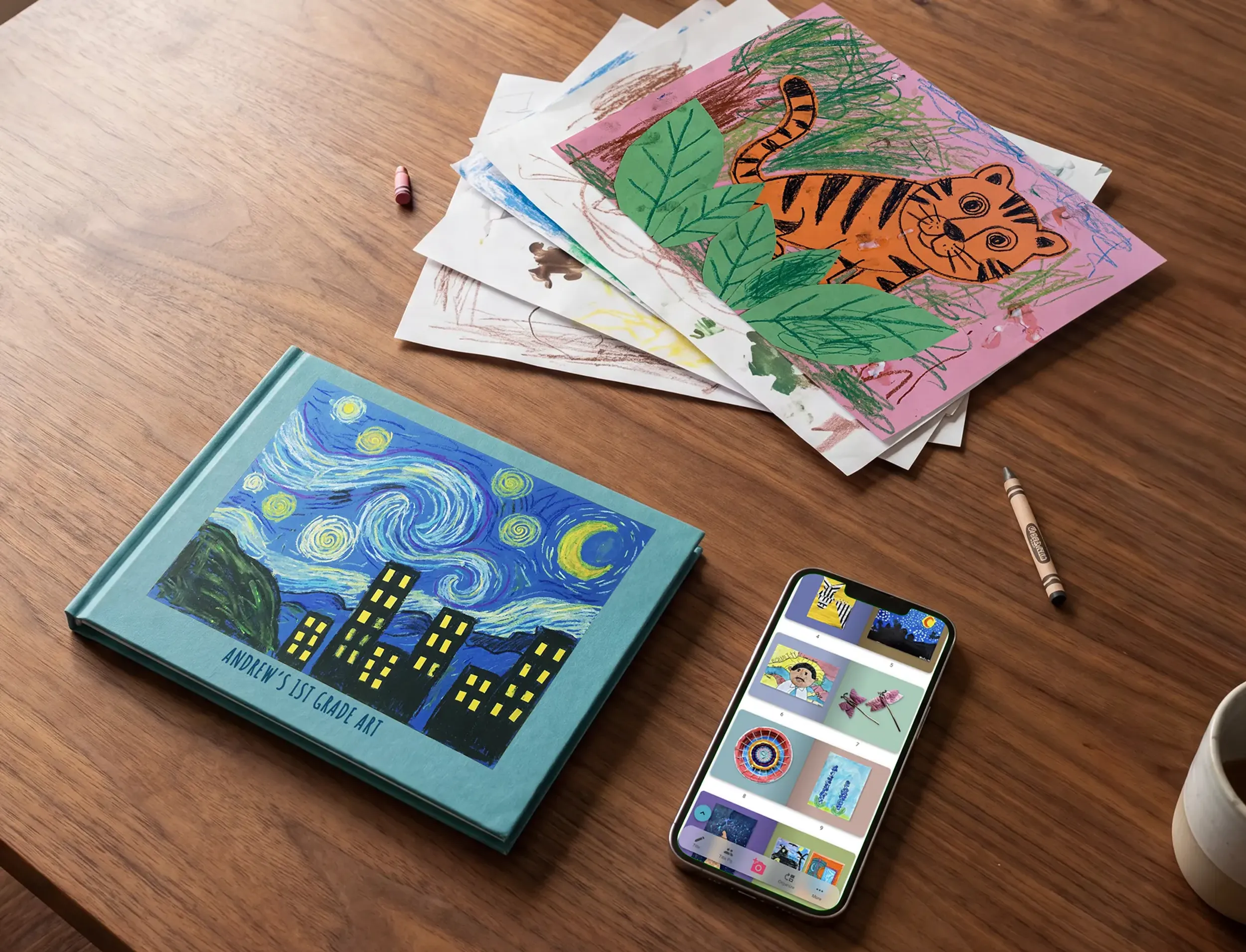 Childrenās artwork beside a finished Scribble Art book