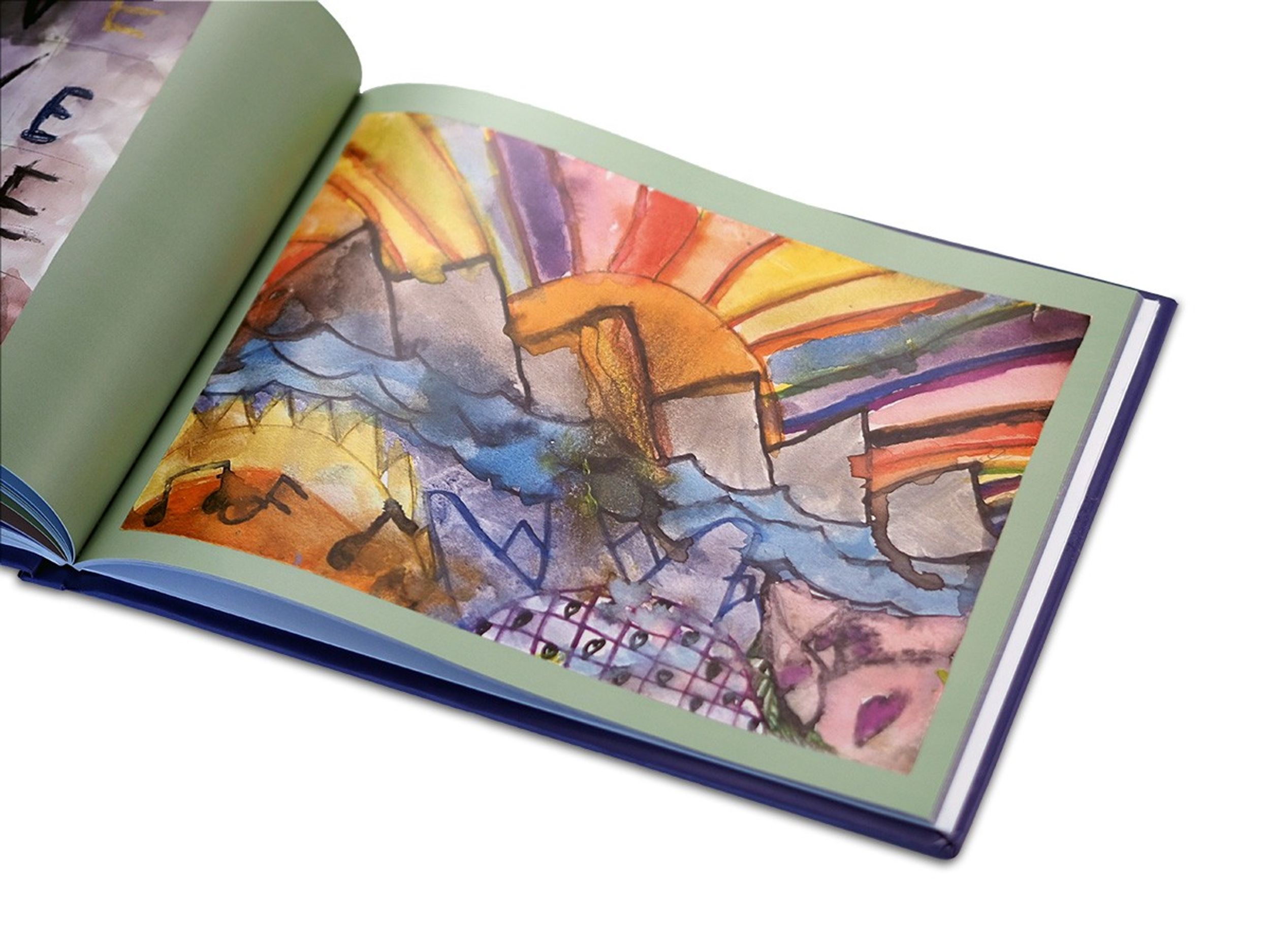 A Scribble book opened and showing how artwork pops on its 100# archival matte paper.